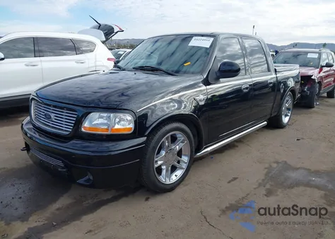 2003 Ford F-150 Lariat z USA, uszkodzony, nr VIN 1FTRW07323KC23526